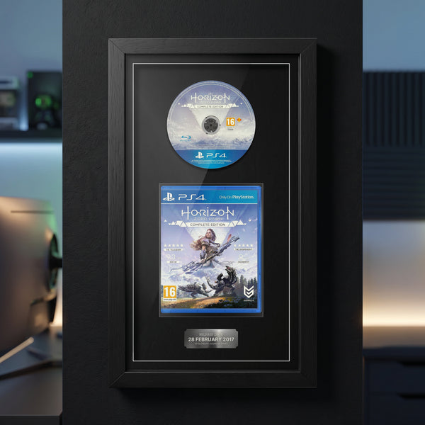 Horizon Zero Dawn Complete Edition PS4 Exhibition Range frame on a dark wall with the disc and case on display