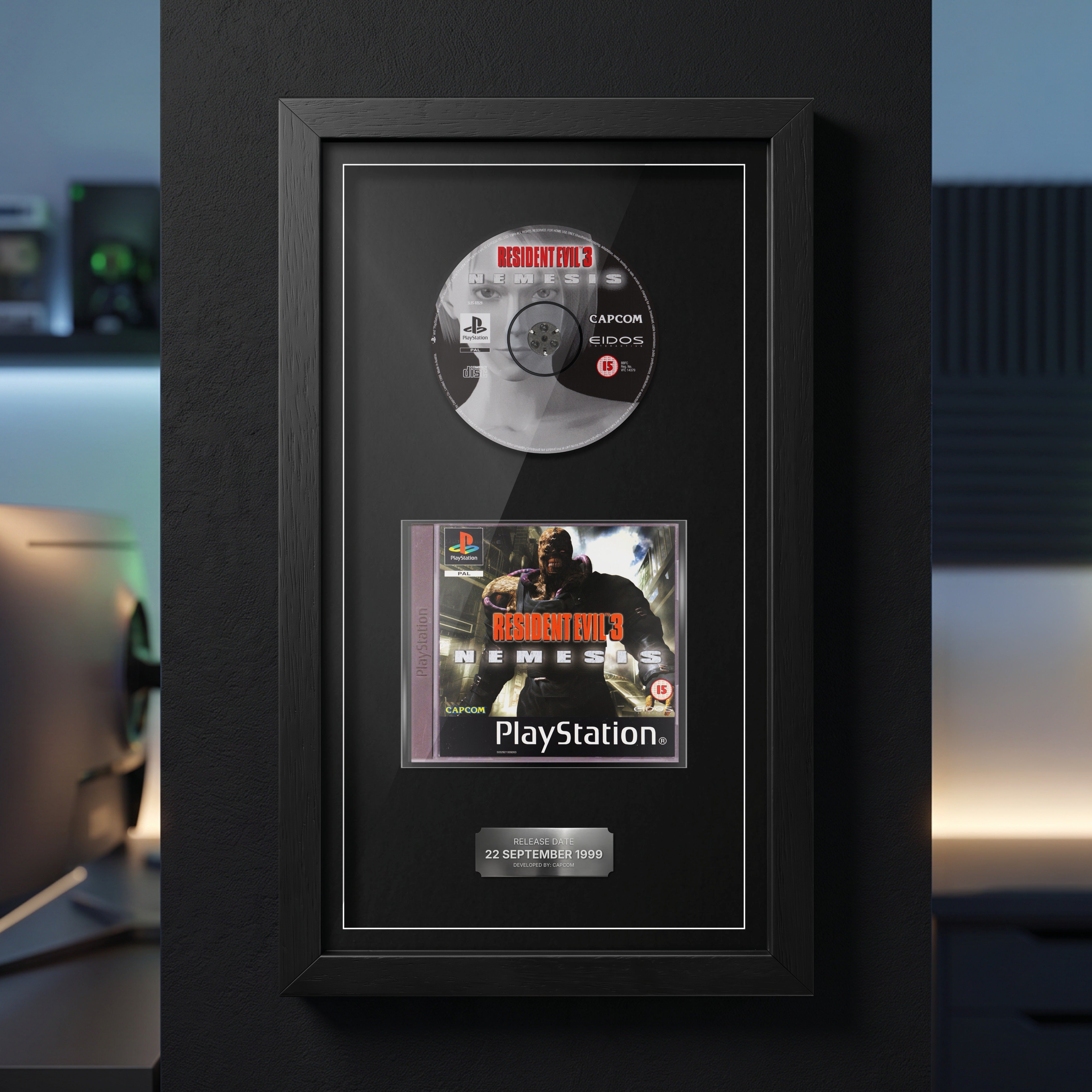 Resident Evil 3: Nemesis PS1 Exhibition Range frame hanging on a games room wall